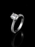Emerald Cut Halo Ring with Side Diamonds