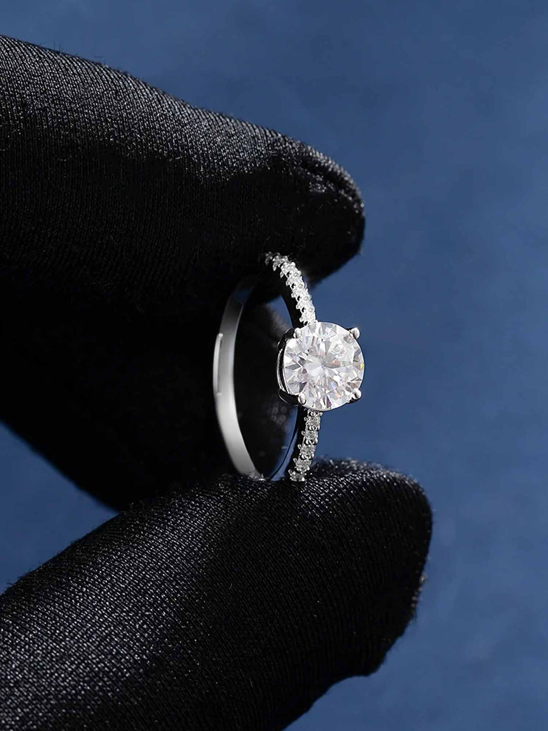 1.1CTW Moissanite Signature Side Stone Round Engagement Ring