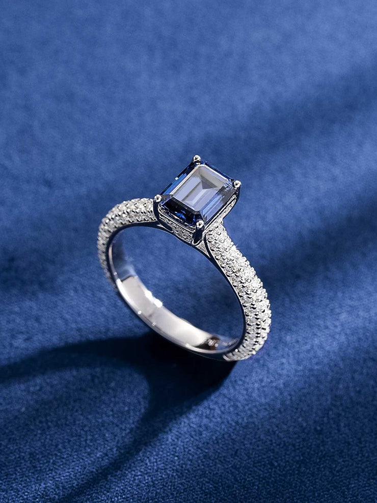 Made To Order Royal Blue Moissanite Emerald Cut Halo Ring with Side Diamonds