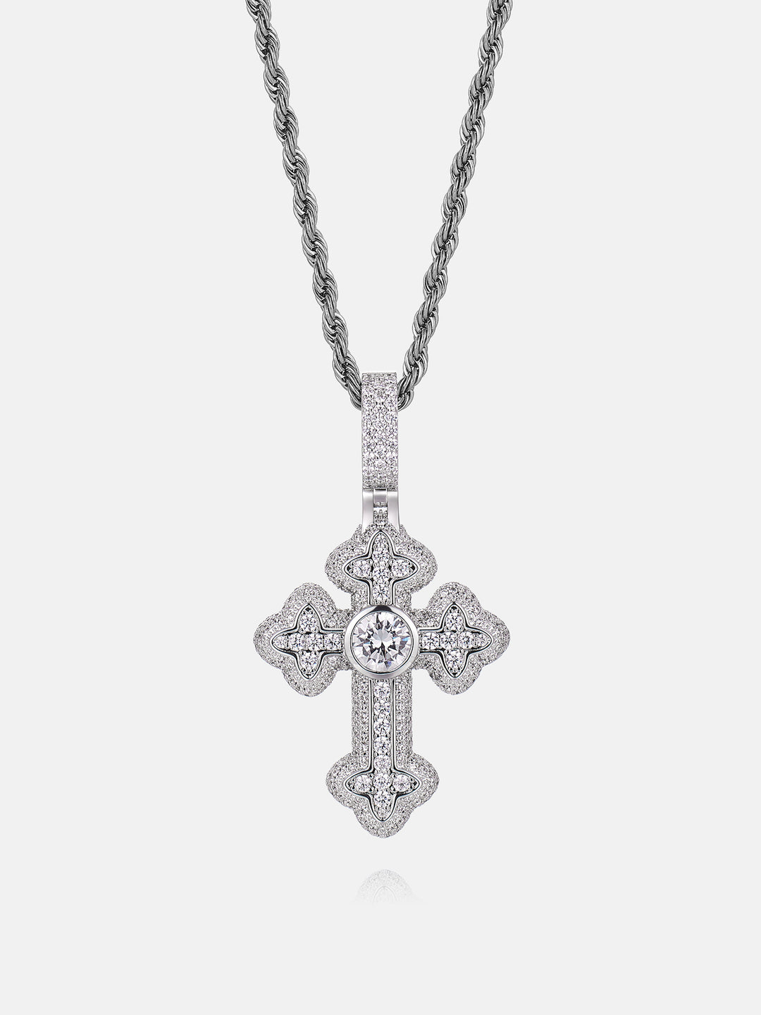 Silver cross pendant necklace on a white background