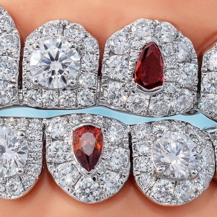 Pave & Half-Bezel Set Diamond w Pear Cut On Fang