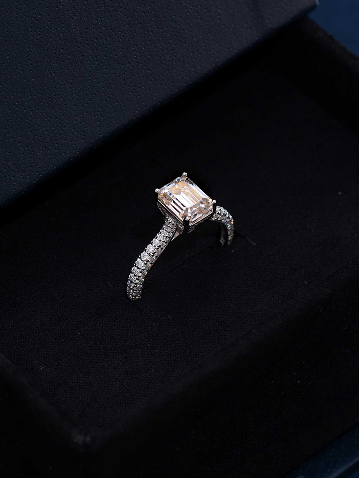Emerald Cut Halo Ring with Side Diamonds