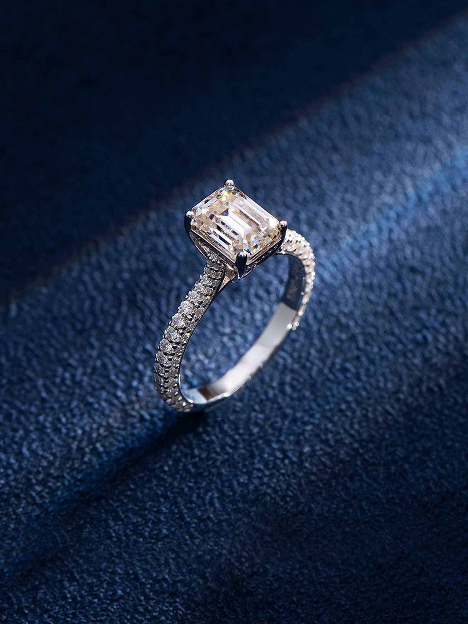 Emerald Cut Halo Ring with Side Diamonds