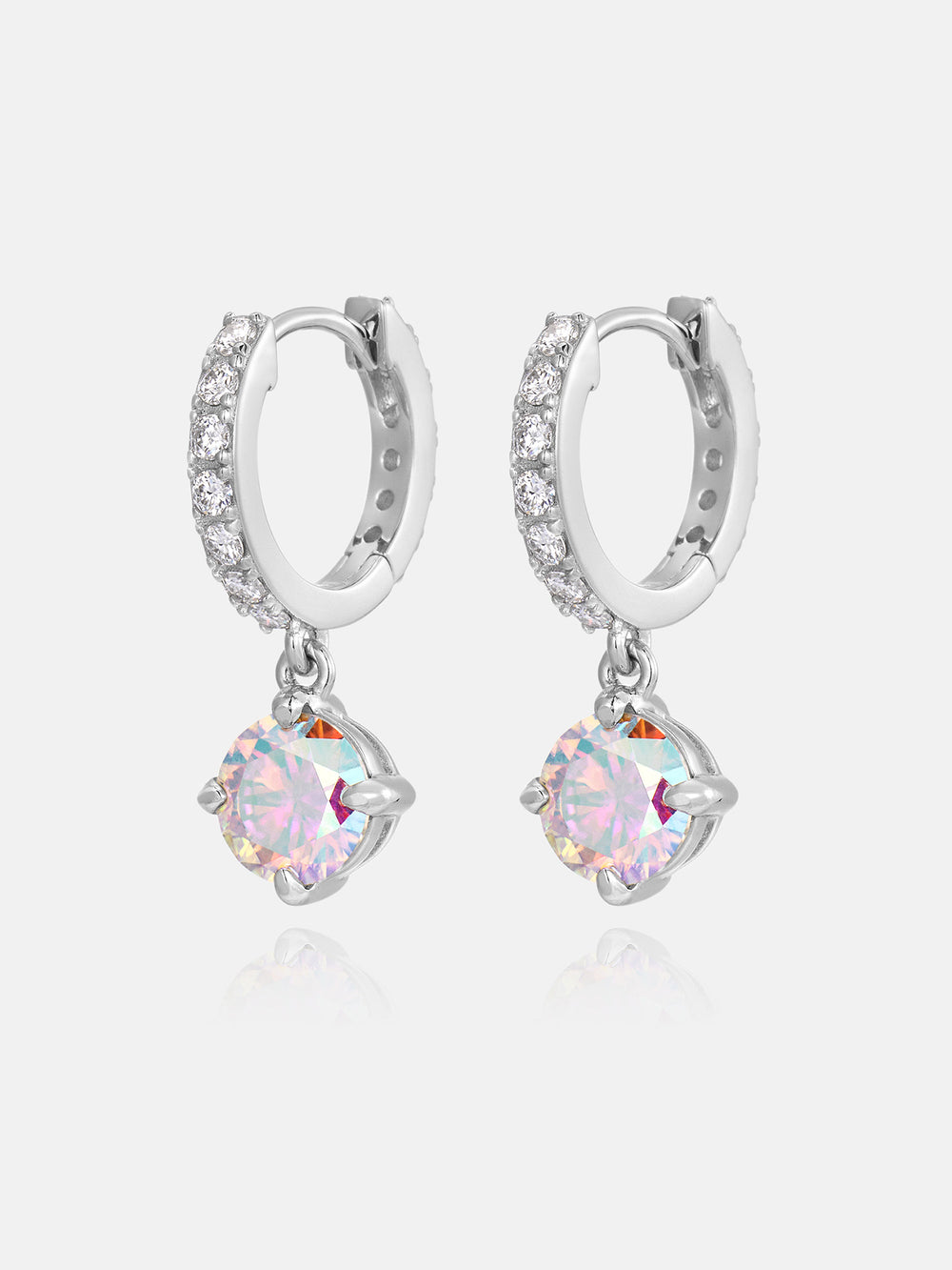 Silver hoop earrings with Rainbow moissanite on a light gray background