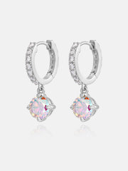Silver hoop earrings with Rainbow moissanite on a light gray background