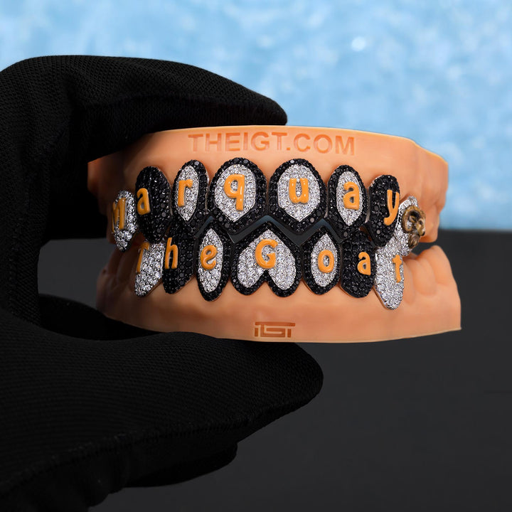 Decorative grill with personalized text held