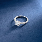 1.1CTW Moissanite Signature Side Stone Round Engagement Ring
