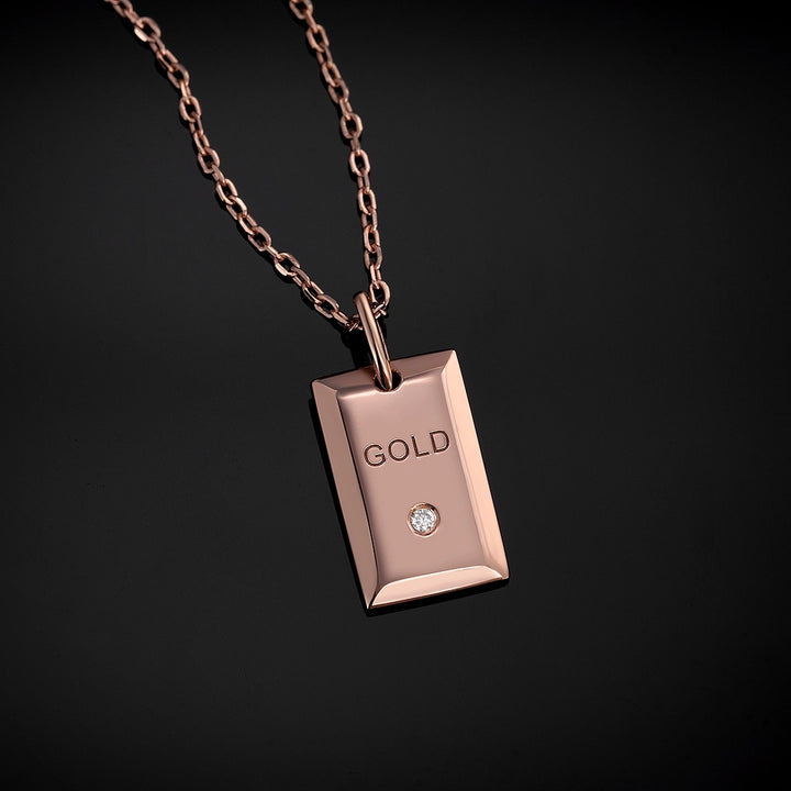 Solid Gold Micro Dollar Pendant