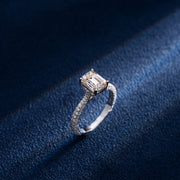 Emerald Cut Halo Ring with Side Diamonds